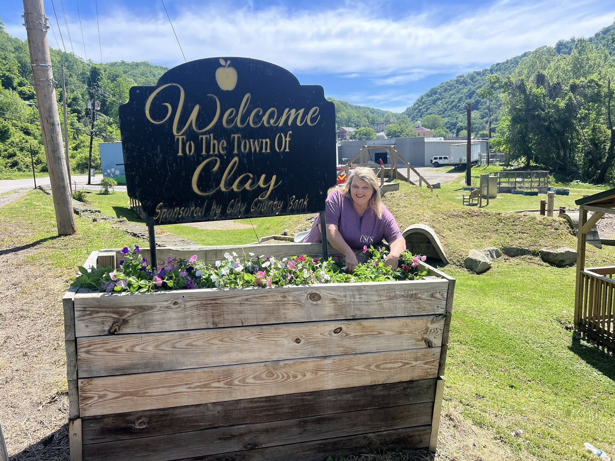 A Town at a Crossroads: New Businesses and Fresh Flowers Rise Alongside Burned Buildings and Lingering Struggles in Clay